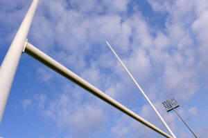 Rugby goalpost on blue sky