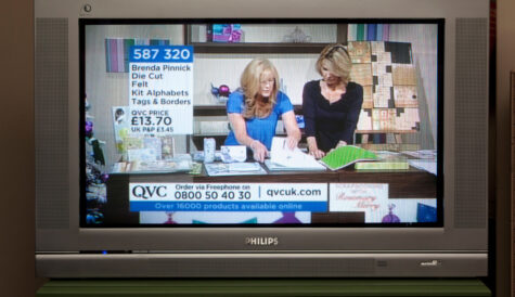 TV screen showing QVC shopping channel